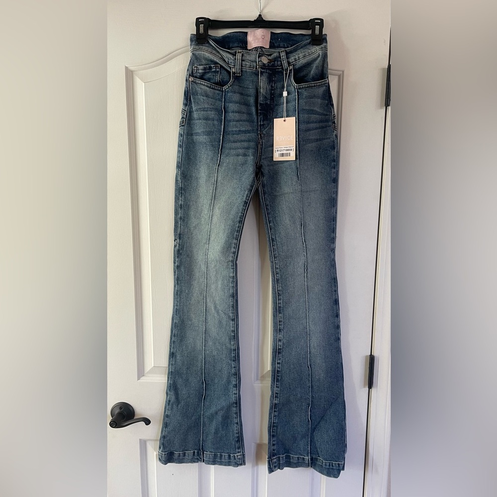 REVICE High Rise Flare Leg Jeans. Size 27. New with tags.